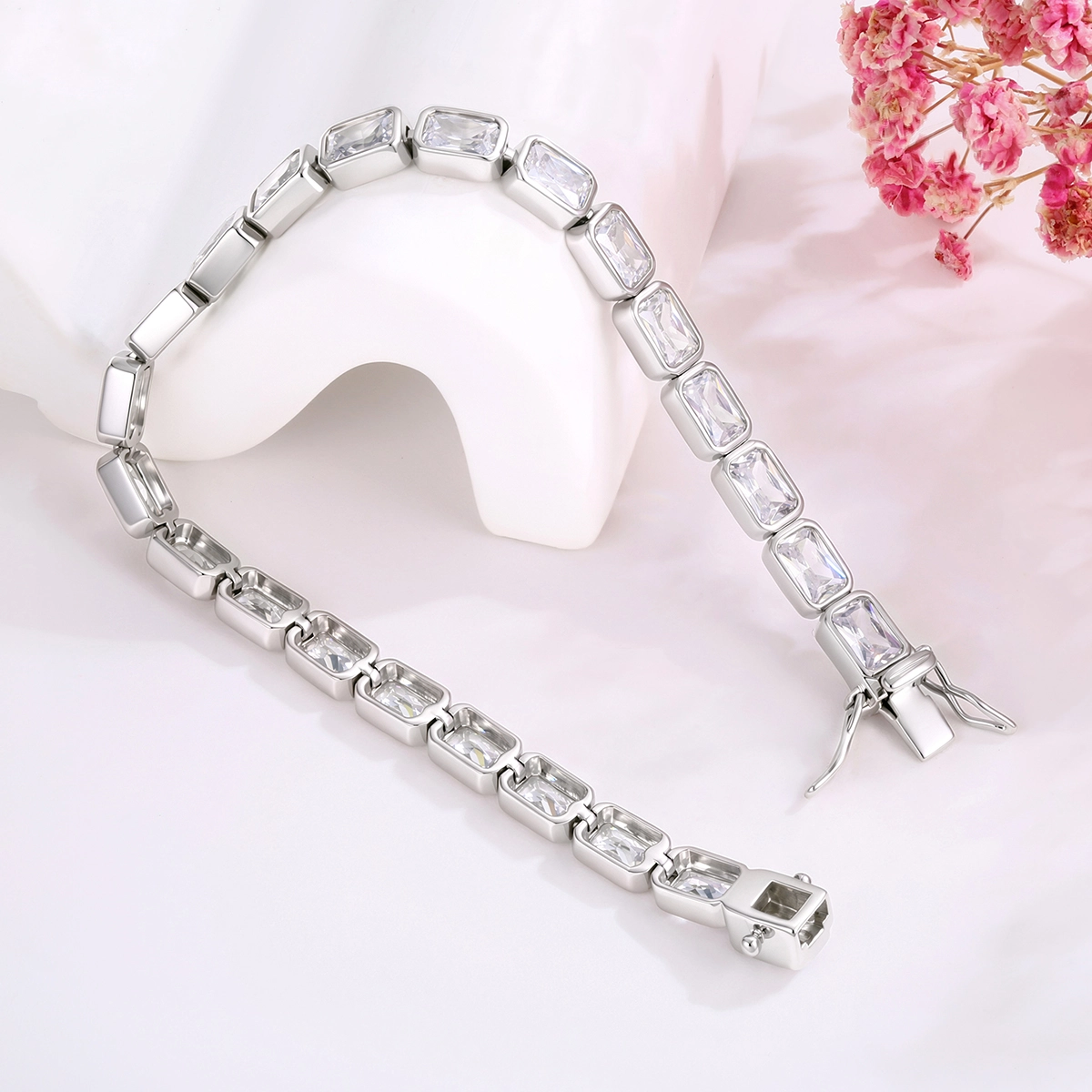 Silver CZ tennis bracelet with polished bezel settings and secure box clasp - Zhefan Jewelry
