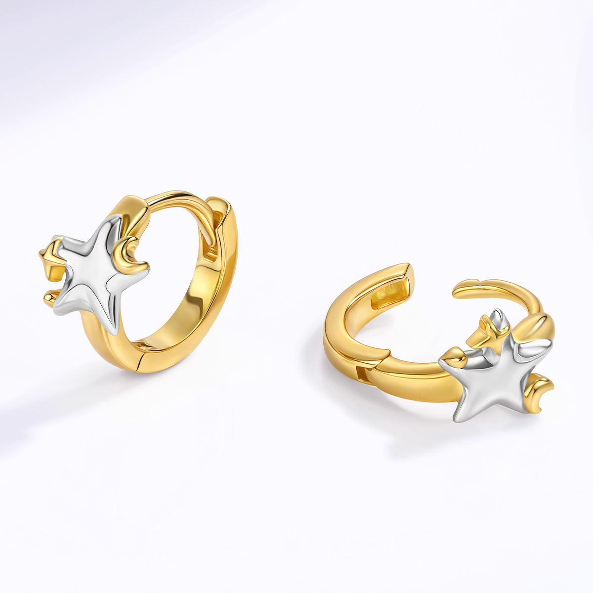 925 silver celestial star hoop earrings displayed on a white background