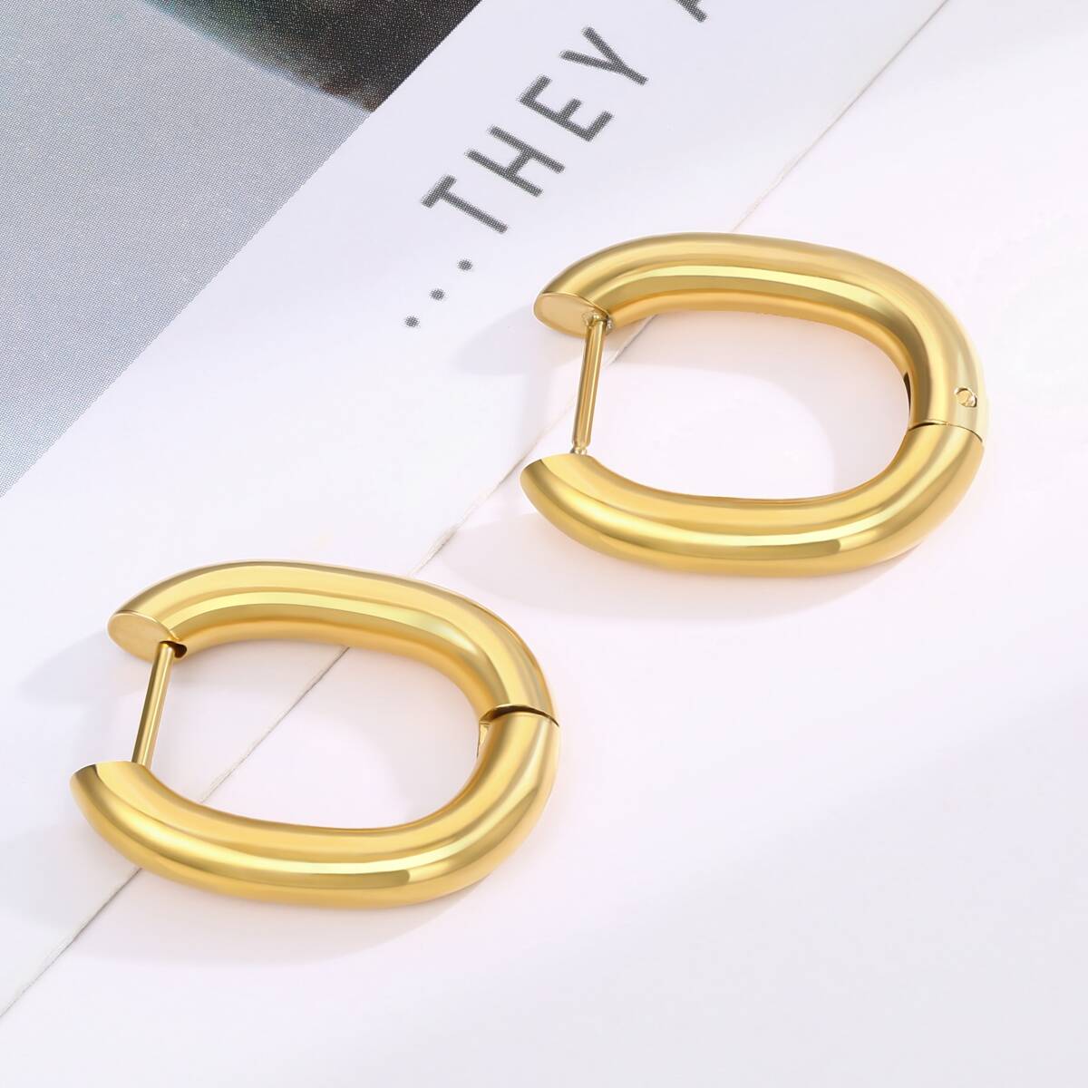 Oval Shape Hugggie Earrings-18K Gold 4