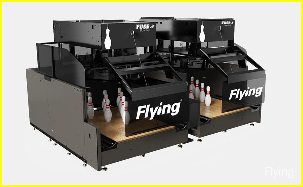 Two black, automated bowling pin resetters with the word "Flying" on the front.