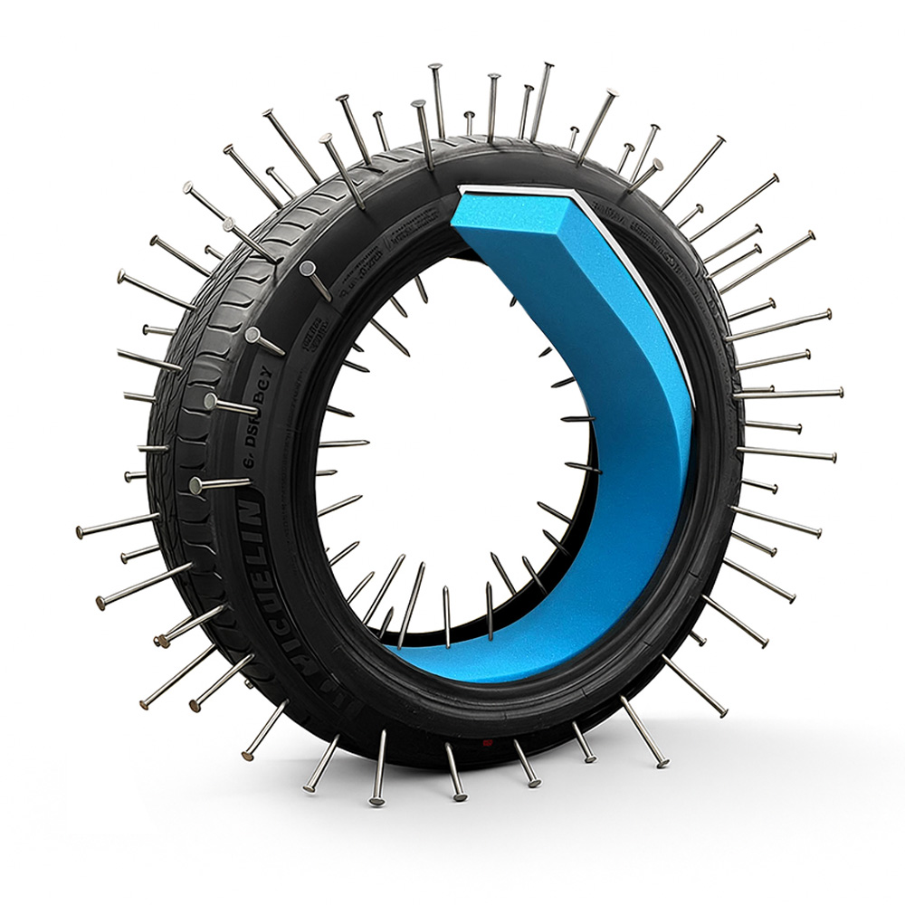 Tire with nails, showcasing tire anti puncture liner.