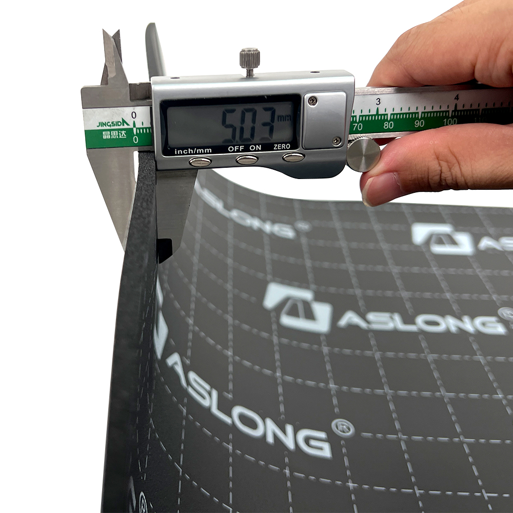 Digital caliper measuring the 5.03mm thickness of a black foam sheet.