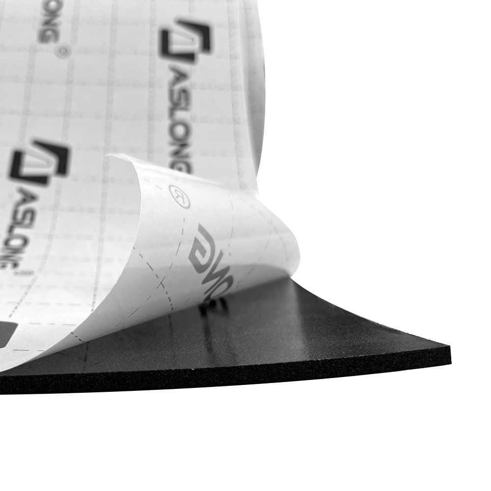 A black self-adhesive foam sheet with the protective backing being peeled off.