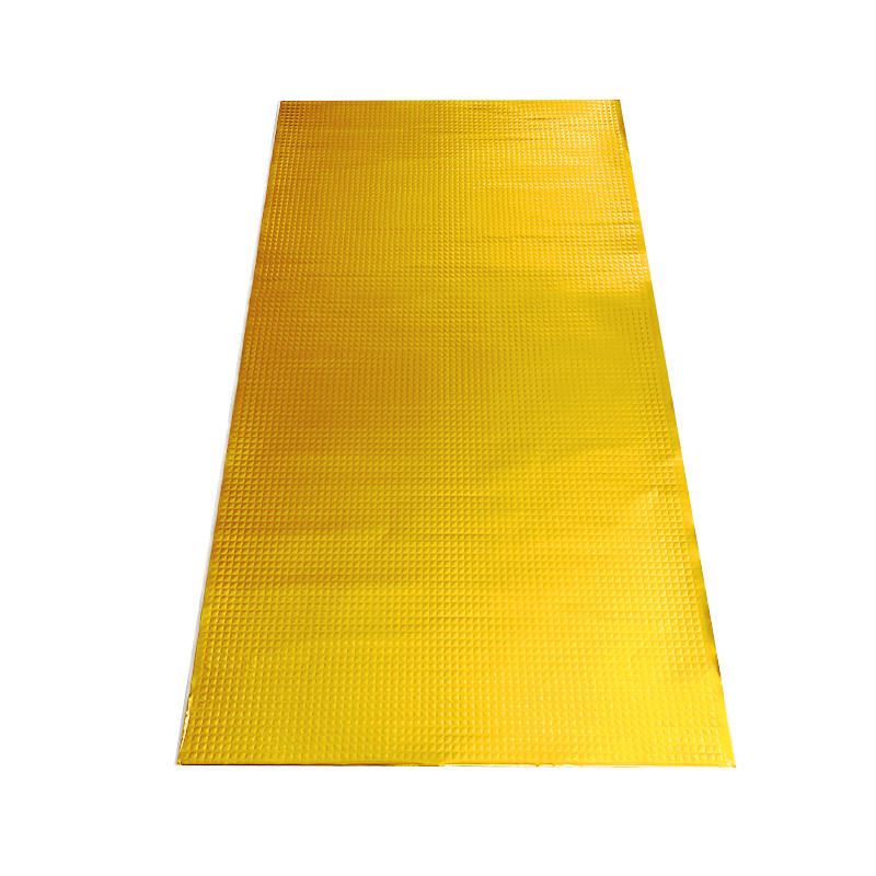 Gold-colored emergency blanket with a textured, diamond-pattern surface.