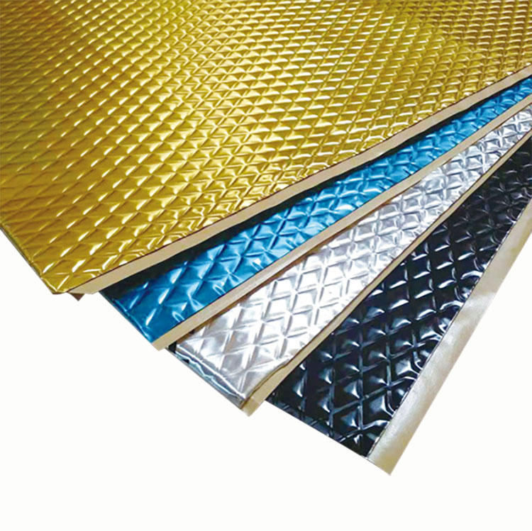 Sheets of gold, blue, silver, and black sound dampening material with a diamond pattern.