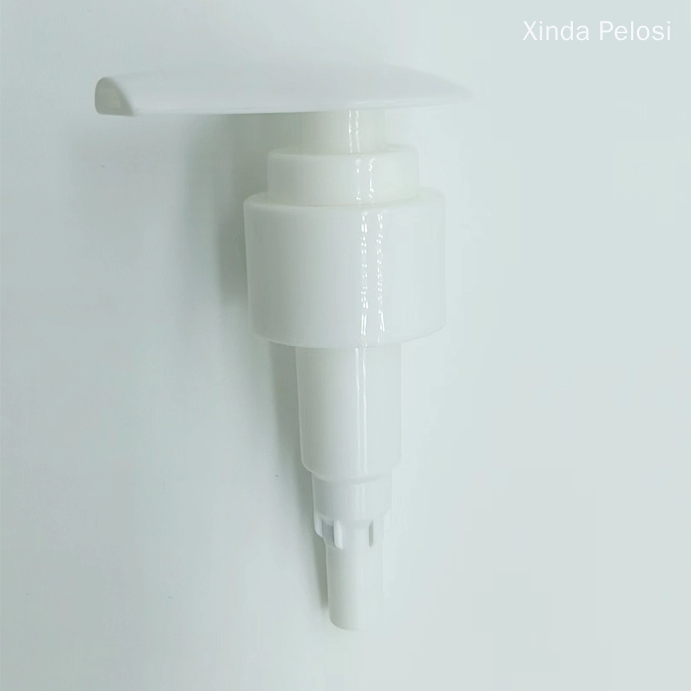 A white plastic lotion pump with a long nozzle.