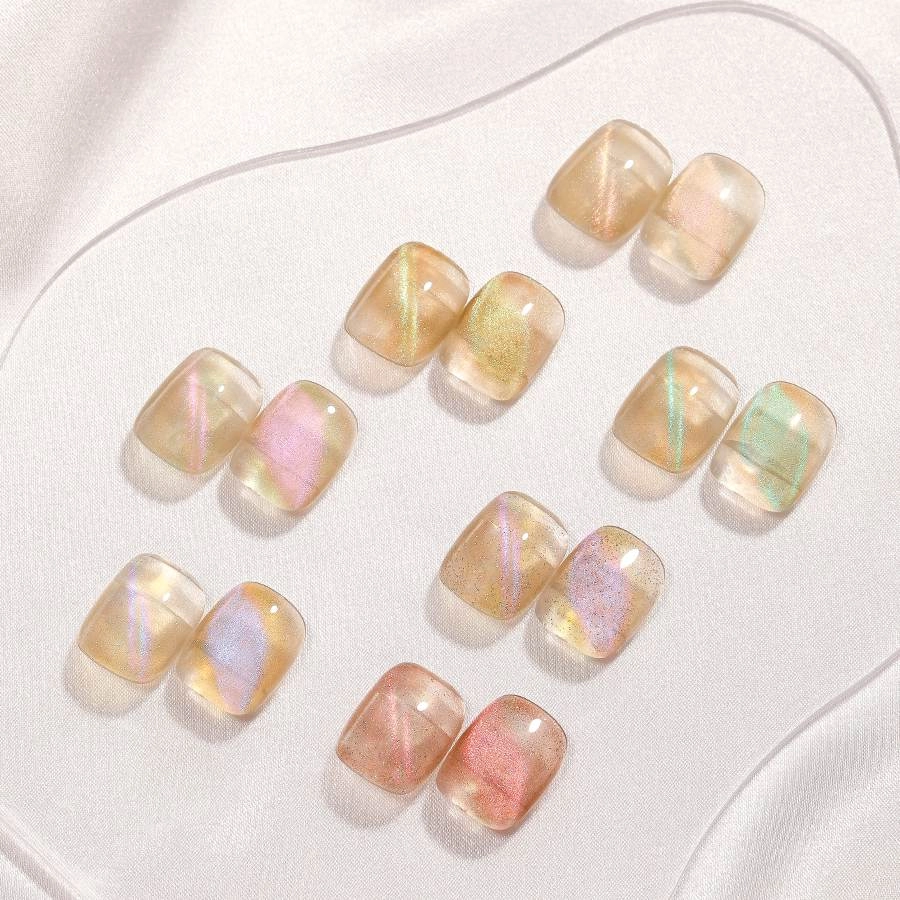 Different-shades-of-Afterglow-cat-eye-gel-nail-polish. Different shades of Afterglow cat eye gel nail polish.