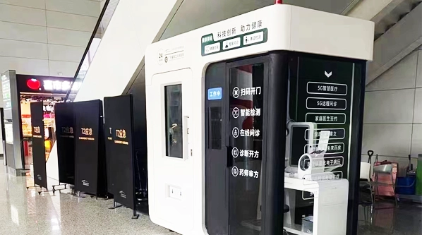 Adult vending machine at night, dispensing various products.