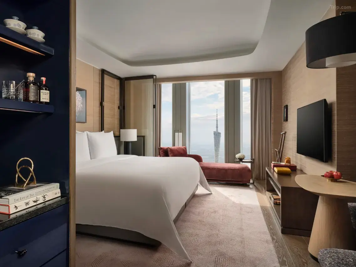 Modern hotel room with a city view of the Canton Tower in Guangzhou.