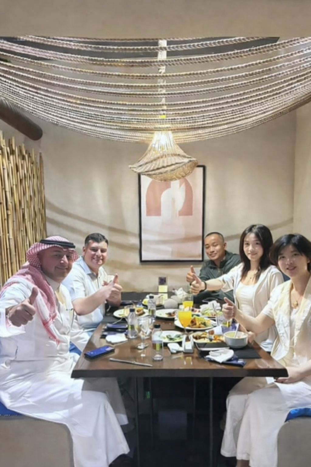 people have dinner at a restaurant after the exhibition