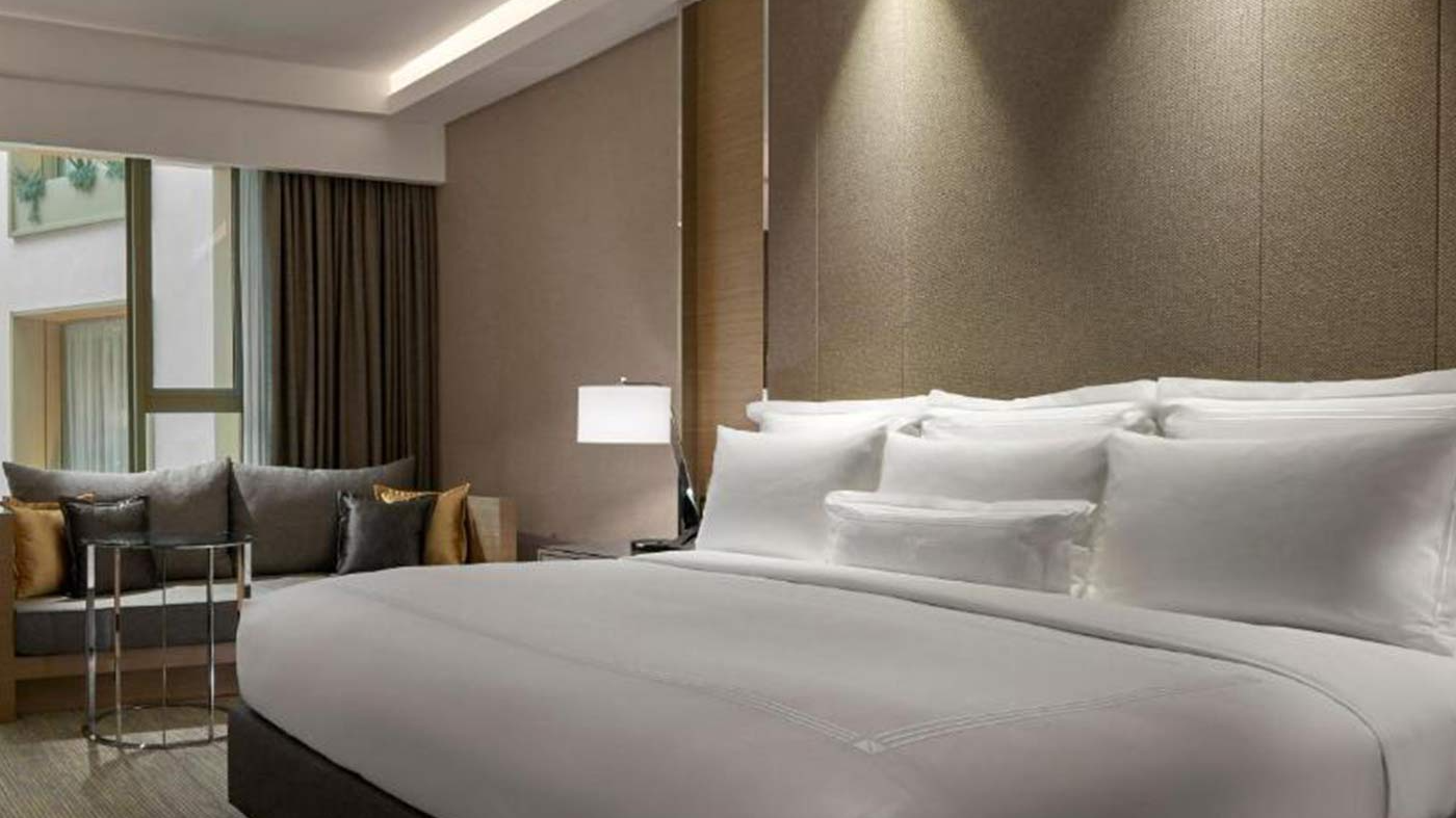 Customized high-end hotel furniture: Luxurious bedroom suite.