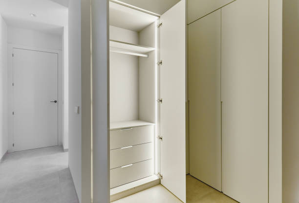 Hotel style open wardrobe with drawers.