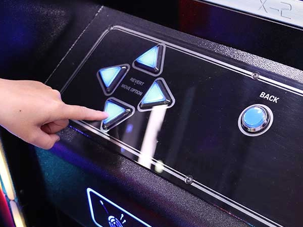 Dart machine button