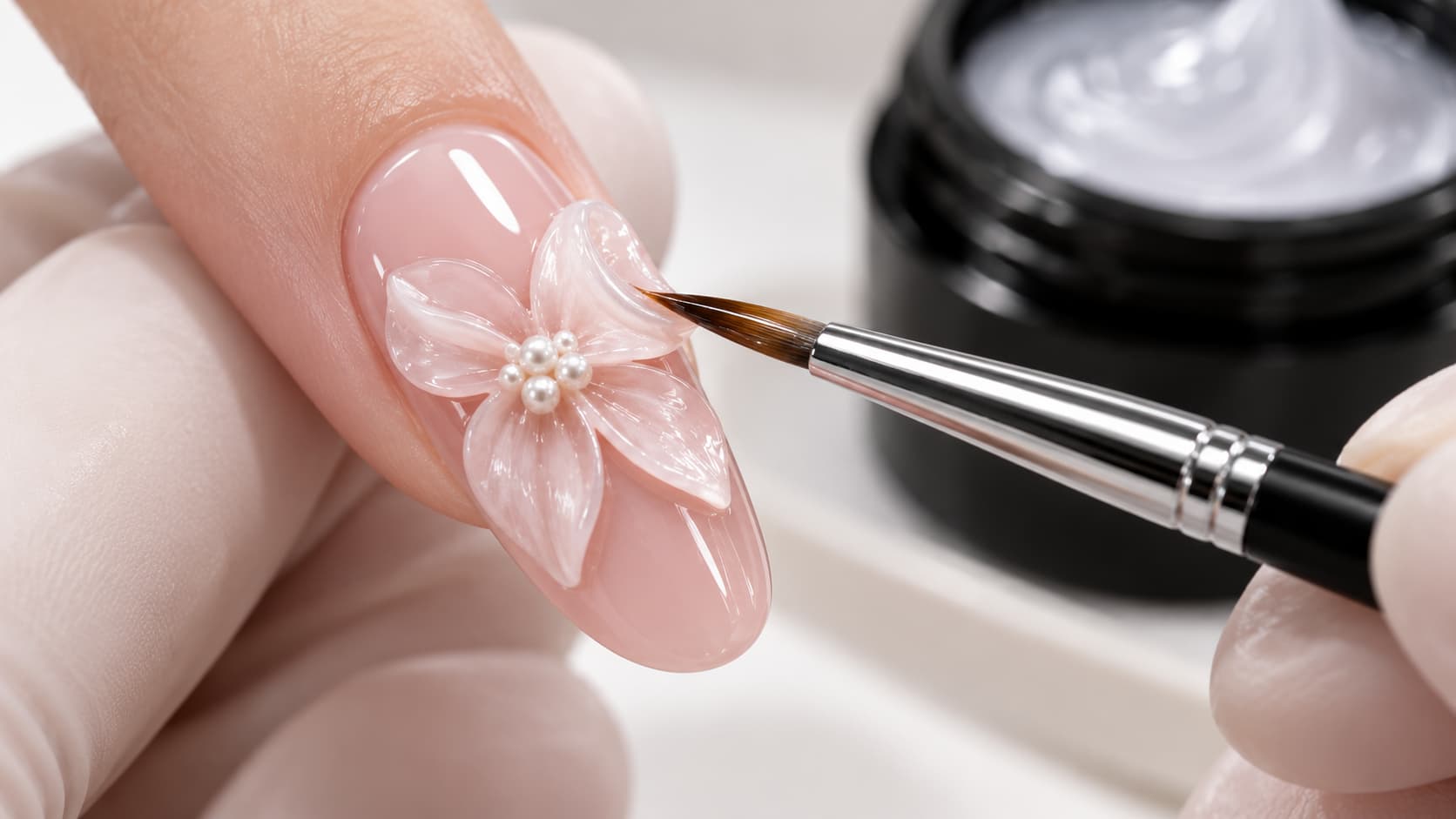 Close-up of molding gel being shaped into a raised 3D flower petal with a sculpting tool