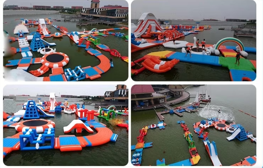 Aerial view of four large inflatable water parks on a lake, featuring slides, climbing structures, and trampolines.