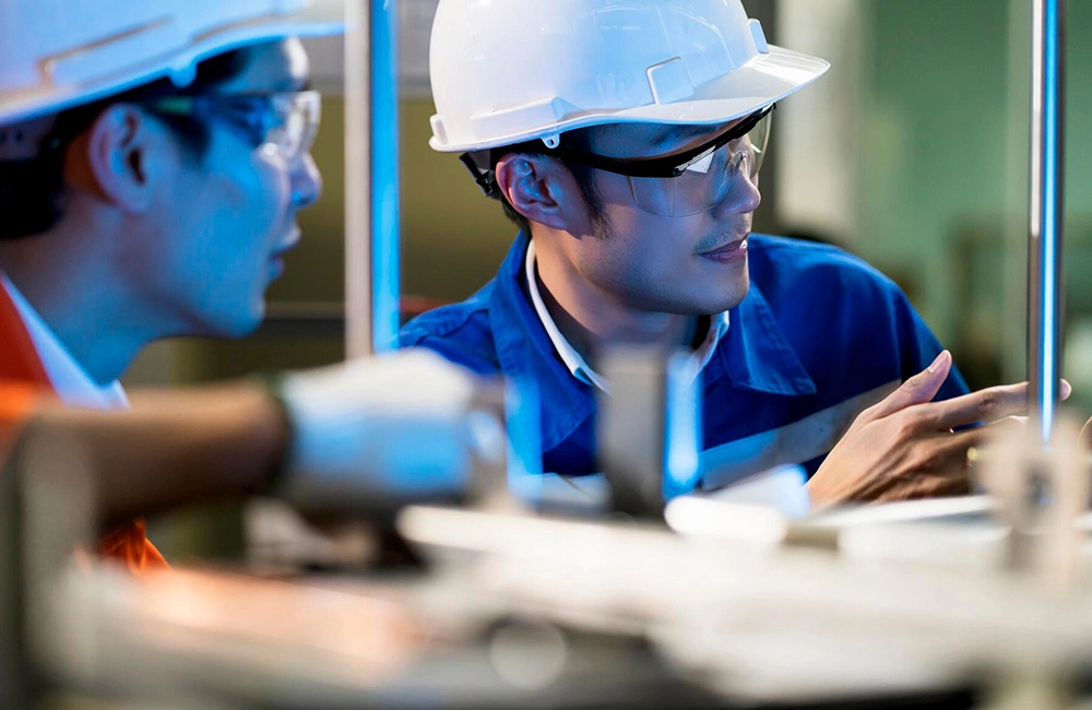 male-asian-engineer-professional-having-discussion-standing-by-machine-factory-two-asian-coworker-brainstorm-explaining-solves-process-curcuit-mother-board-machine_609648-995