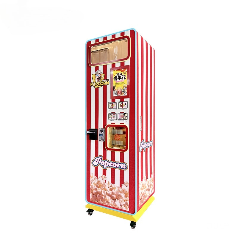 Red and white striped popcorn vending machine with a digital display and coin slot.