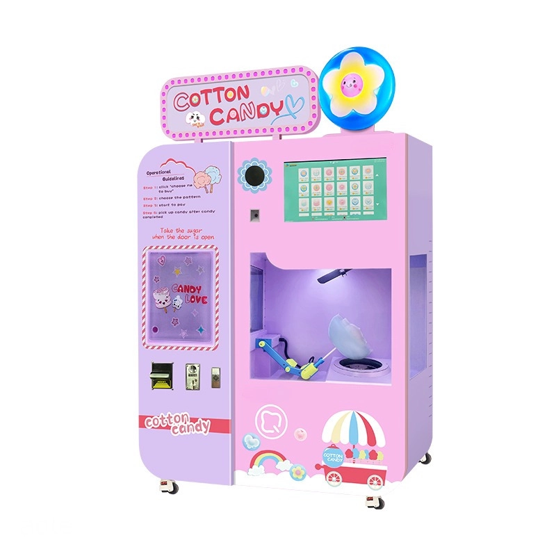 máquina de algodón de azúcar rosa Máquina expendedora automatizada de algodón de azúcar de color rosa con diseños de dibujos animados y una interfaz de pantalla táctil.
