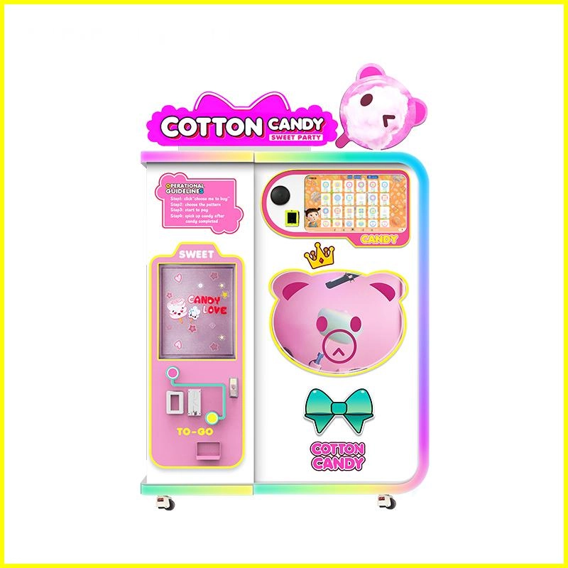 Máquina de algodón de azúcar popular Máquina automática de algodón de azúcar de color rosa con dibujos de osos y lazos; las instrucciones de uso son visibles.