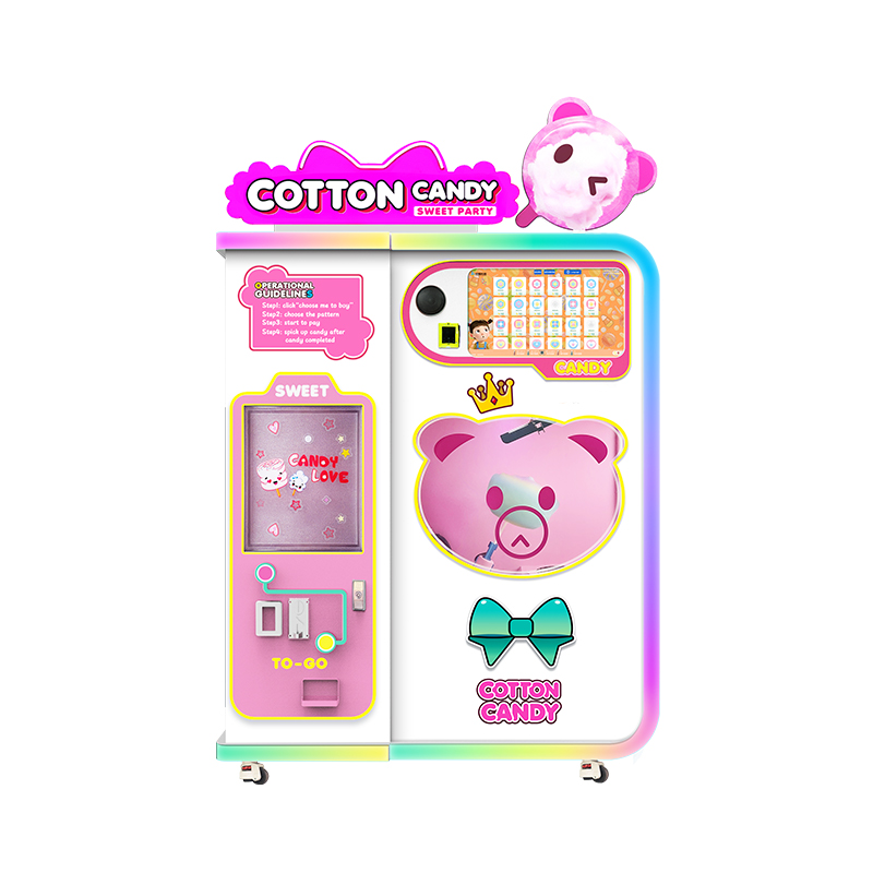 Pink automated cotton candy machine with cartoon bear and bow graphics; instructions for use are visible.