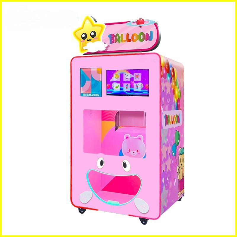 Pink balloon dispensing arcade game with cartoonish design and touch screen.