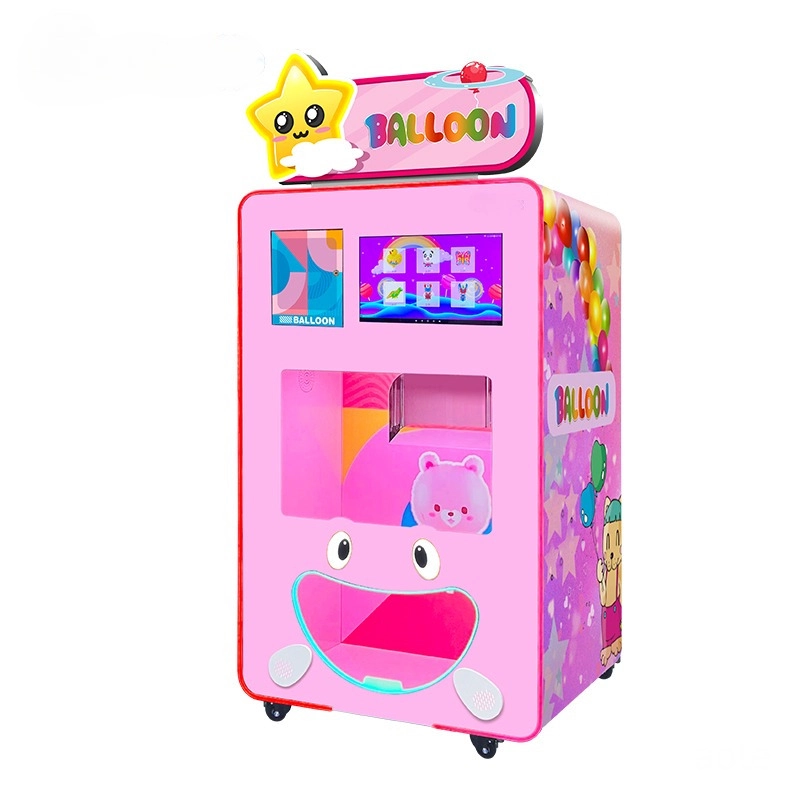 Pink balloon dispensing arcade game with cartoonish design and touch screen.