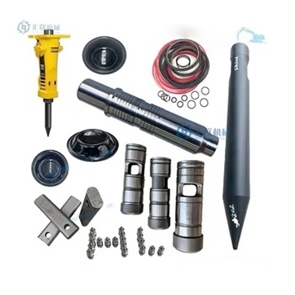 Assorted parts for a hydraulic breaker, including the breaker itself, piston, cylinder, seals, and other small components.