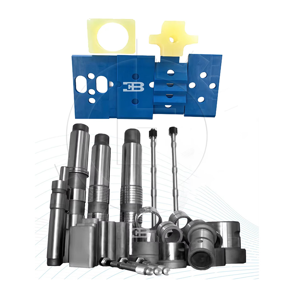 Assorted metal and plastic components for industrial machinery, including a blue valve plate and various cylindrical and ring-shaped parts.