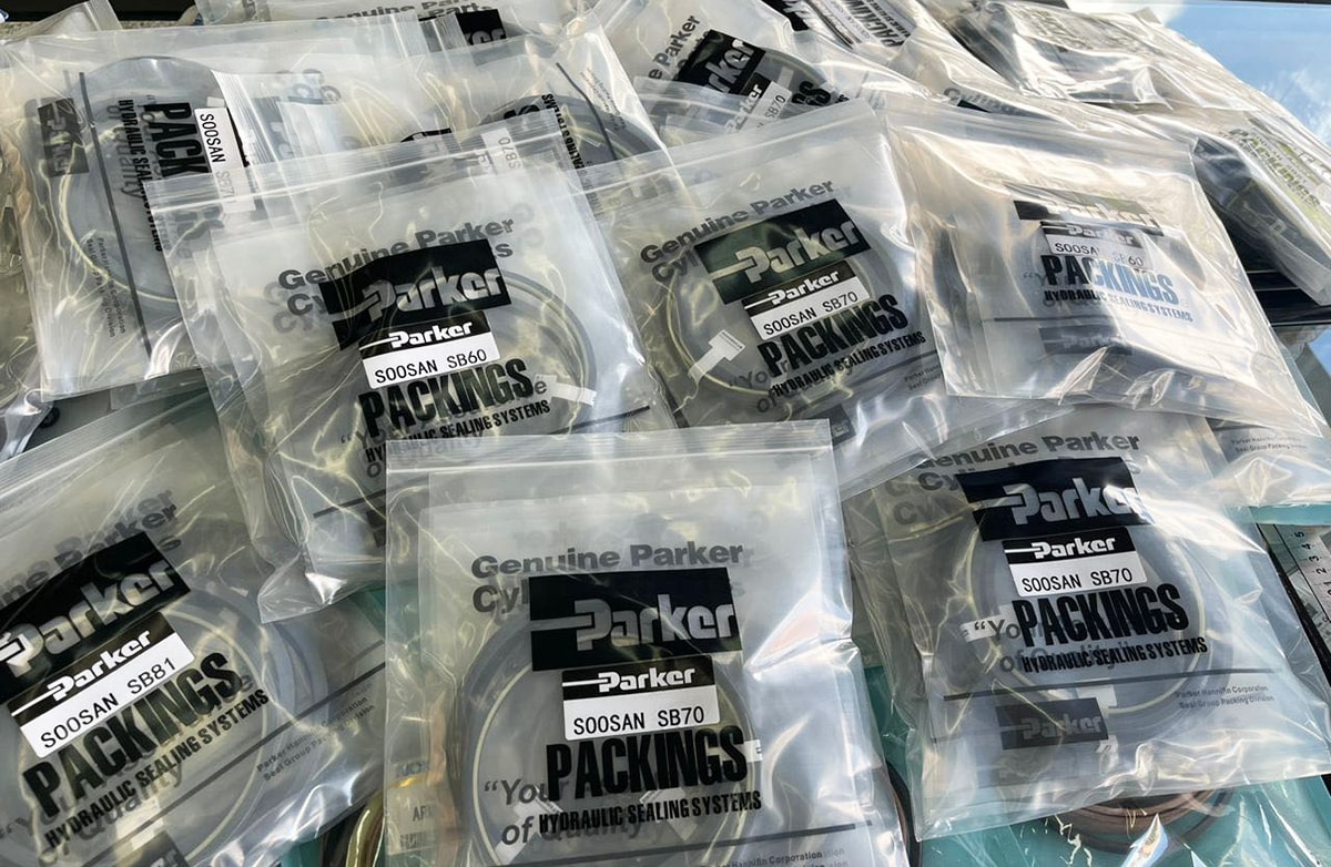 Packages of genuine Parker SB40 hydraulic breaker hammer sealing system packings.