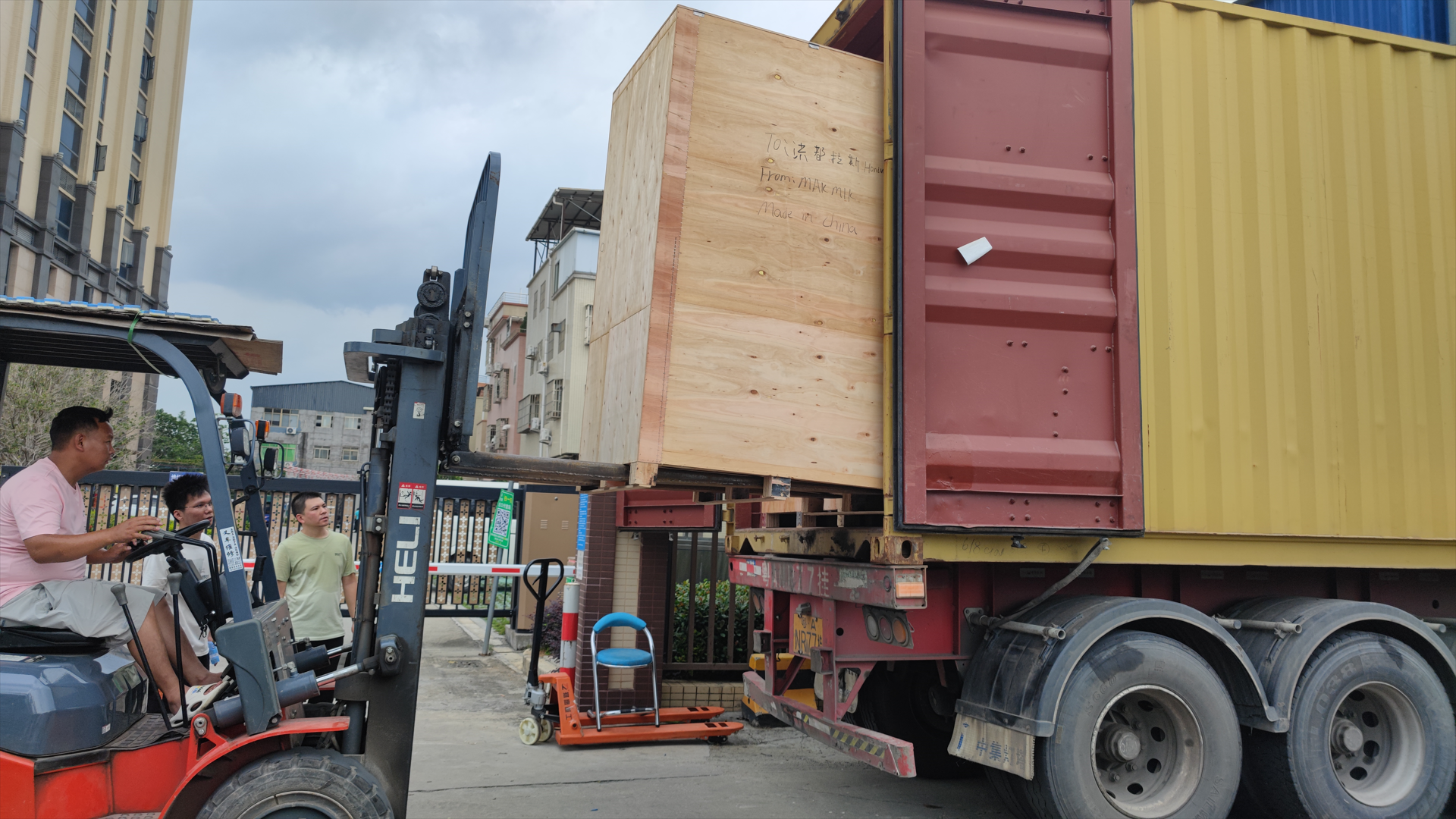 Forklift loading 36 Vending Machines Loaded into Containers and Shipped to Panama.