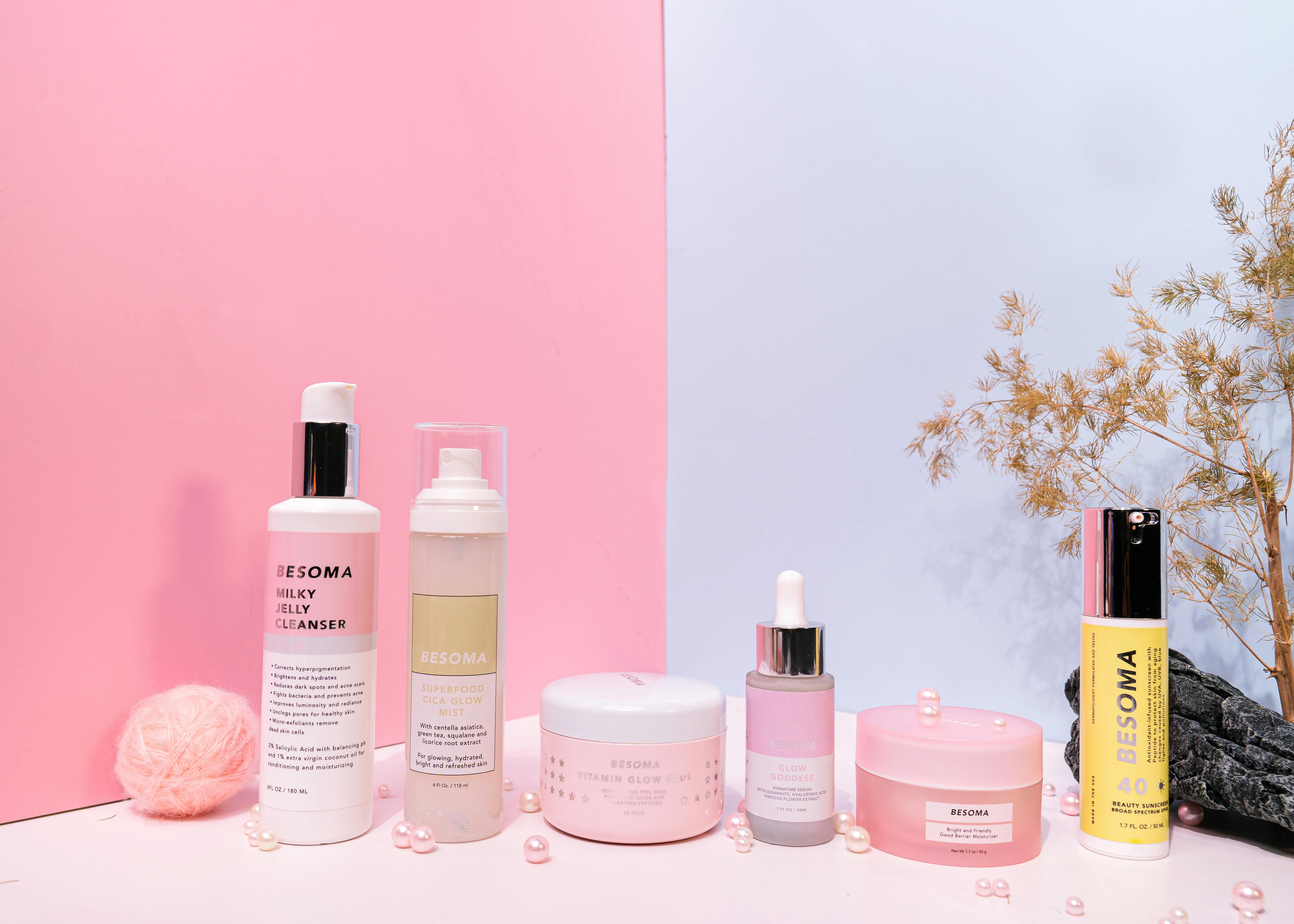 Aesthetic product photography of skincare items on a pink and blue background. Aesthetic product photography of skincare items on a pink and blue background.