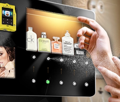 MK-PM-bs002 Hand receiving perfume spray from a perfume vending machine.