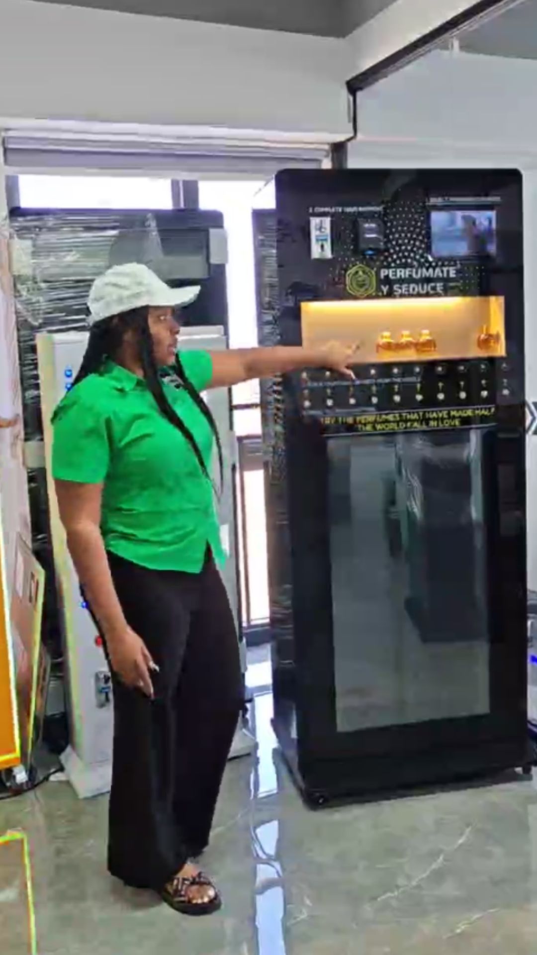 MAKMIK perfume vending machine, ideal for malls, hotel lobbies, and luxury retail spaces.