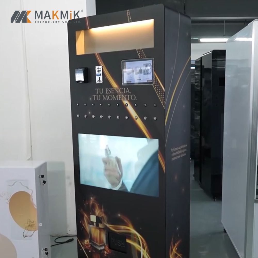 Black MAKMIK Brand Perfume Spray and Sample Vending Machine MK-PM-S002 featuring digital displays and scent nozzles.