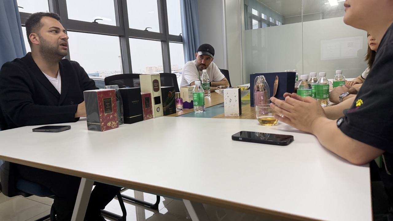 Business meeting with perfume samples on the table. Business meeting with perfume samples on the table.