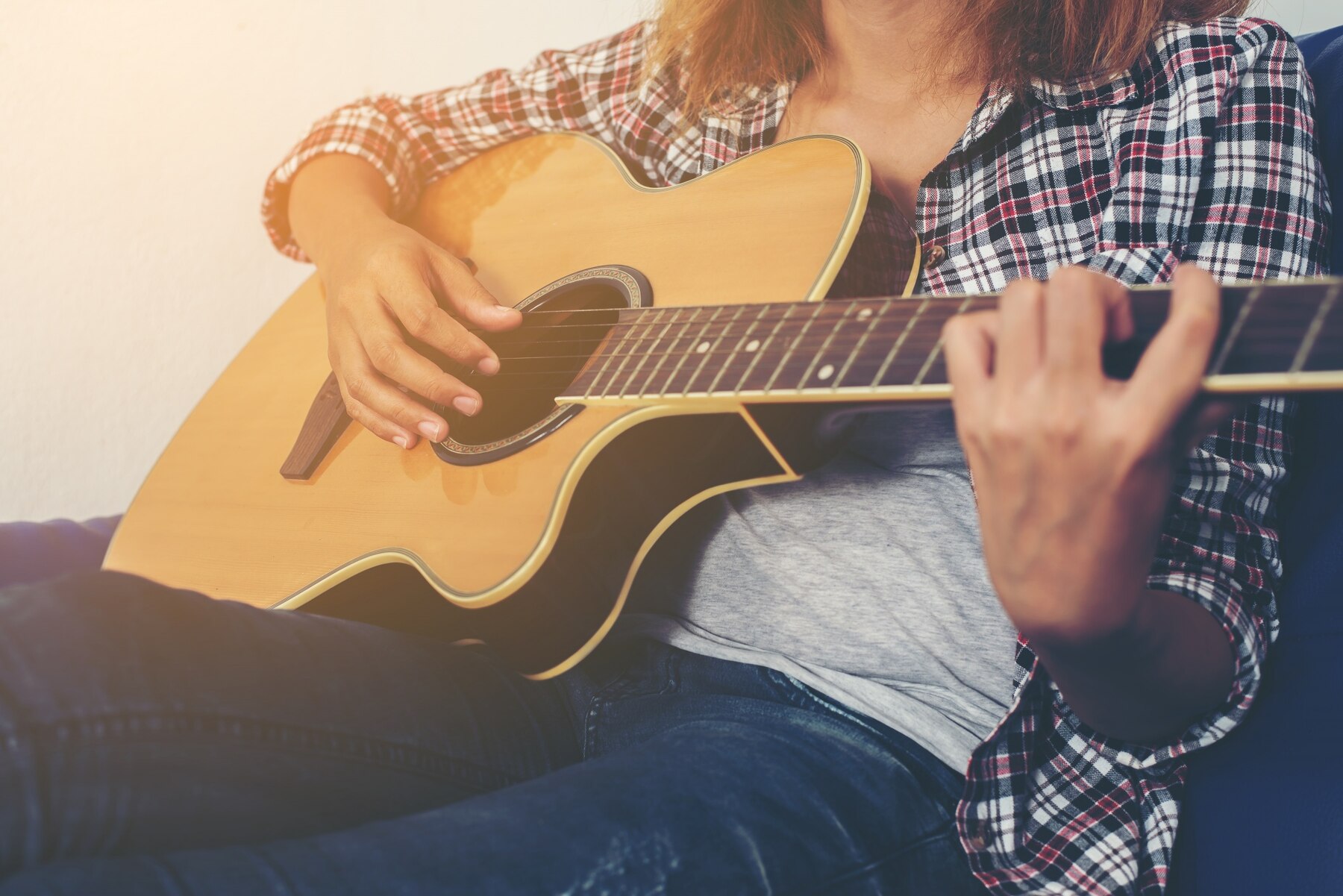 girl-playing-classic-guitar_1150-134