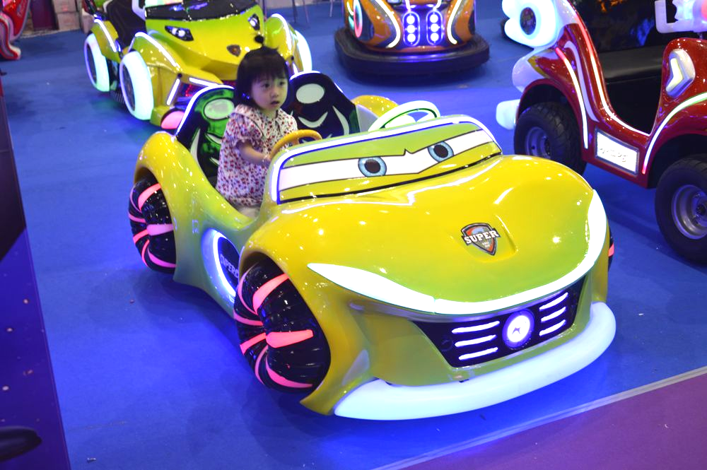 A 5-year-old girl riding the Future Overrun Kid Car