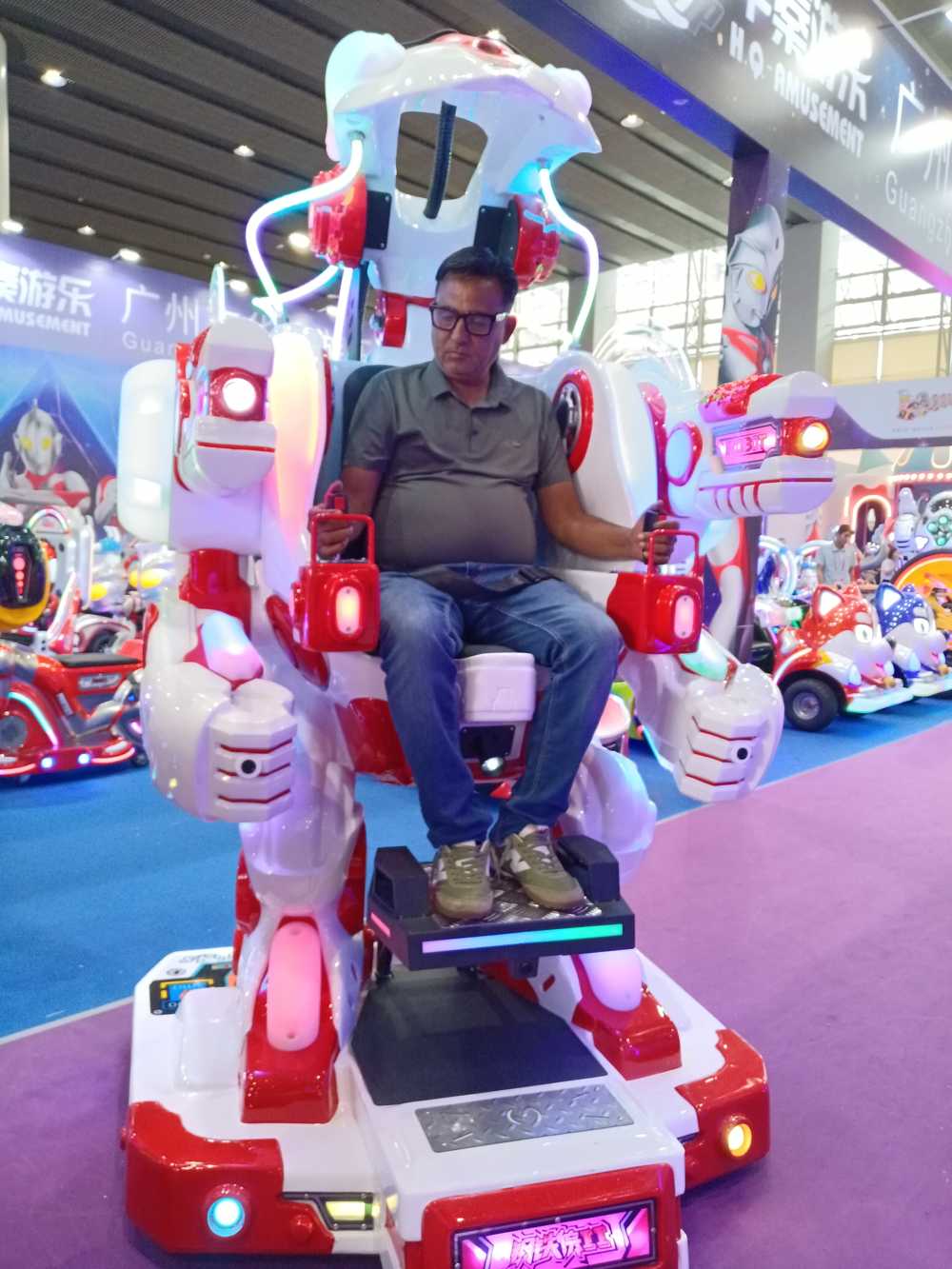 A Korean person experiencing the White Walking Robot Ride 2nd Generation