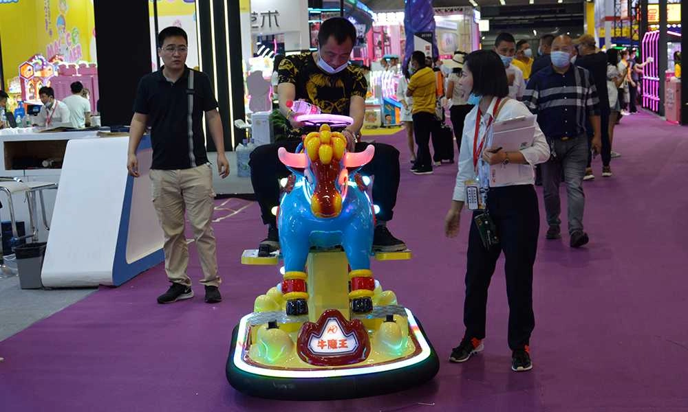 adult riding mechanical bull swing ride at trade show - H.Q.Amusement