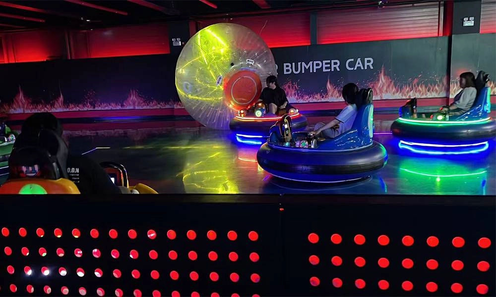adults riding bumper cars with inflatable bubble ball in a colorful arena - H.Q.Amusement