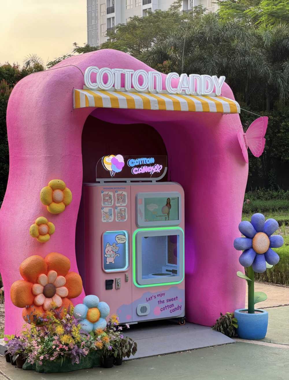 Automatic cotton candy machine with a dreamy theme decoratio