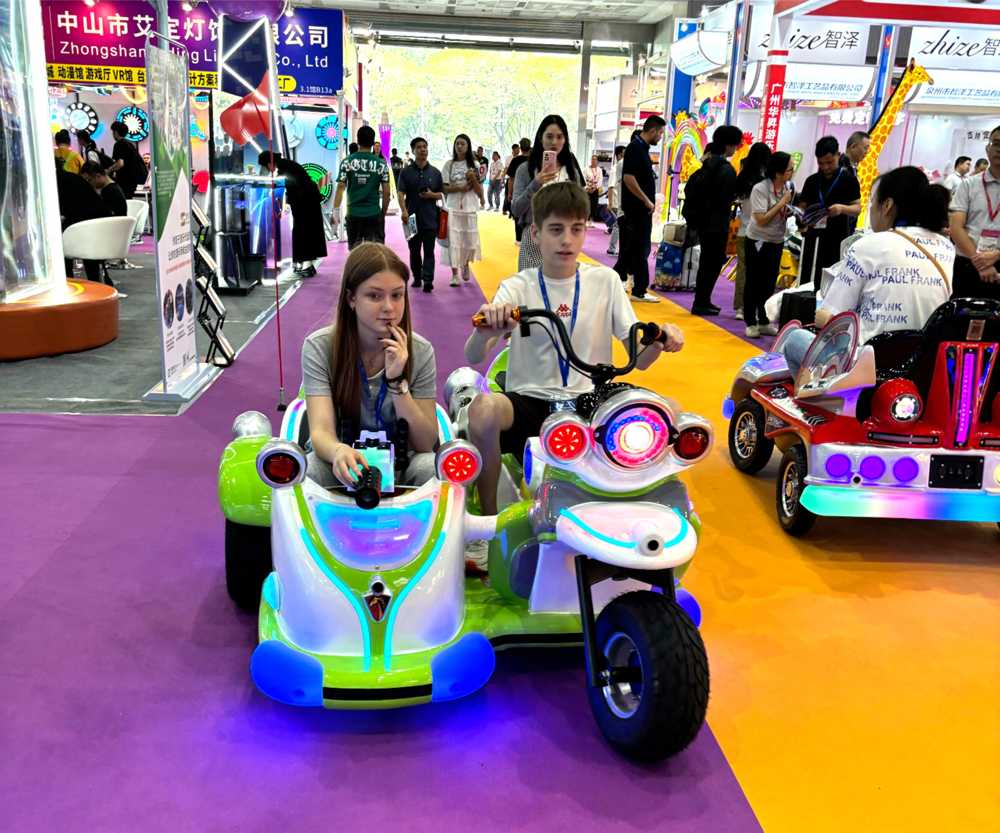Brother and sister riding parent-child motorcycle