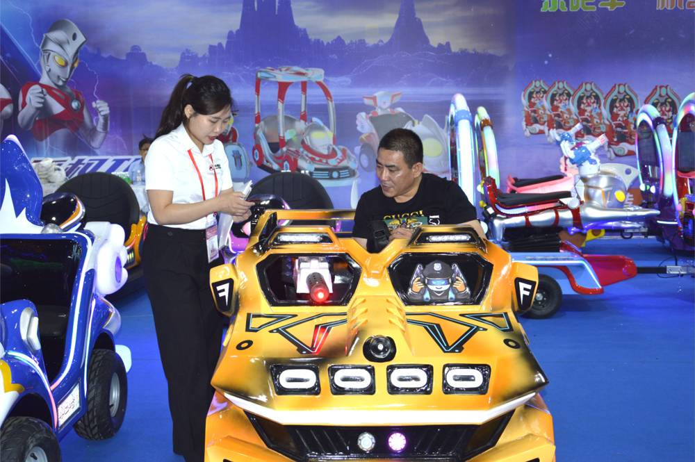 businessman experiencing the Thunder Chariot Electric Kid Car.