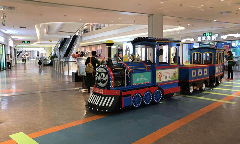 electric thomas trackless train ride in a shopping mall