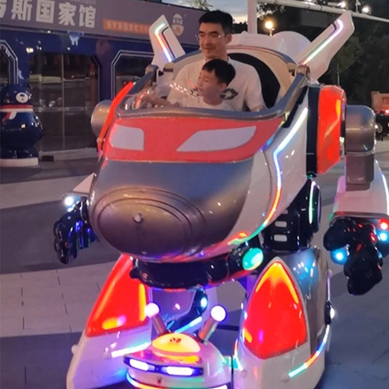 Father and son riding in a brightly lit aviark warrior robot kiddie ride - H.Q.Amusement