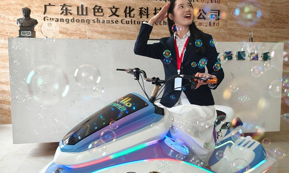 Happy rider on motorboat kiddie ride surrounded by bubbles - H.Q.Amusement