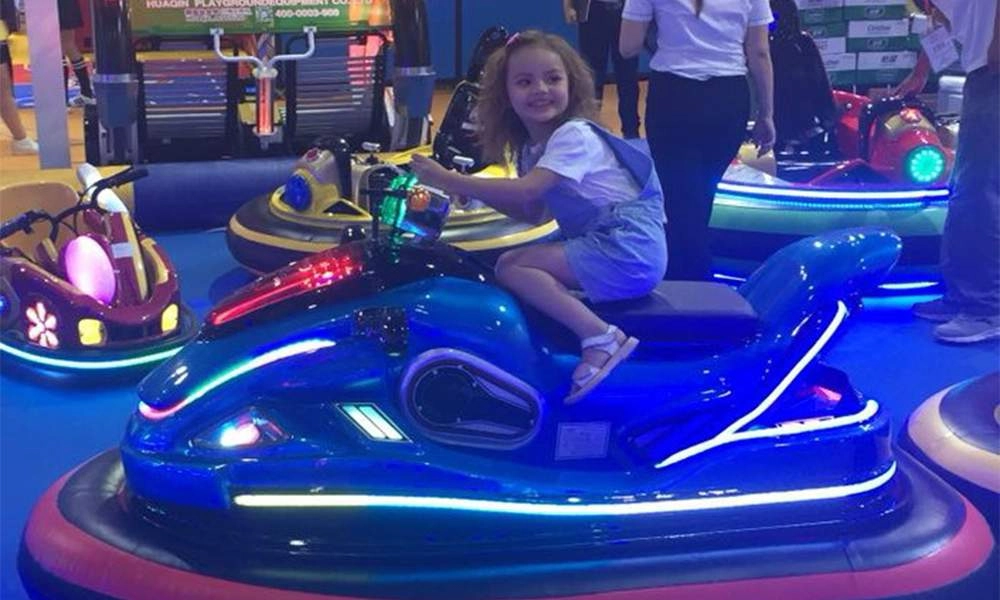 little girl had a great time riding the motorboat bumper car - H.Q.Amusement