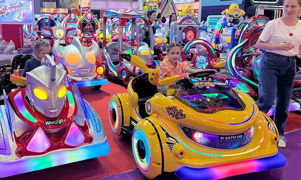 little girl riding pika battery car at trade show - H.Q.Amusement