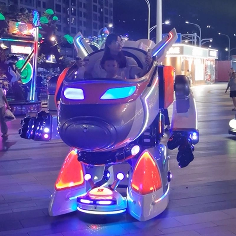Mother-and-child-riding-in-an-illuminated-robot-ride-at-night - H.Q.Amusement Mother and child riding in an illuminated robot ride at night - H.Q.Amusement