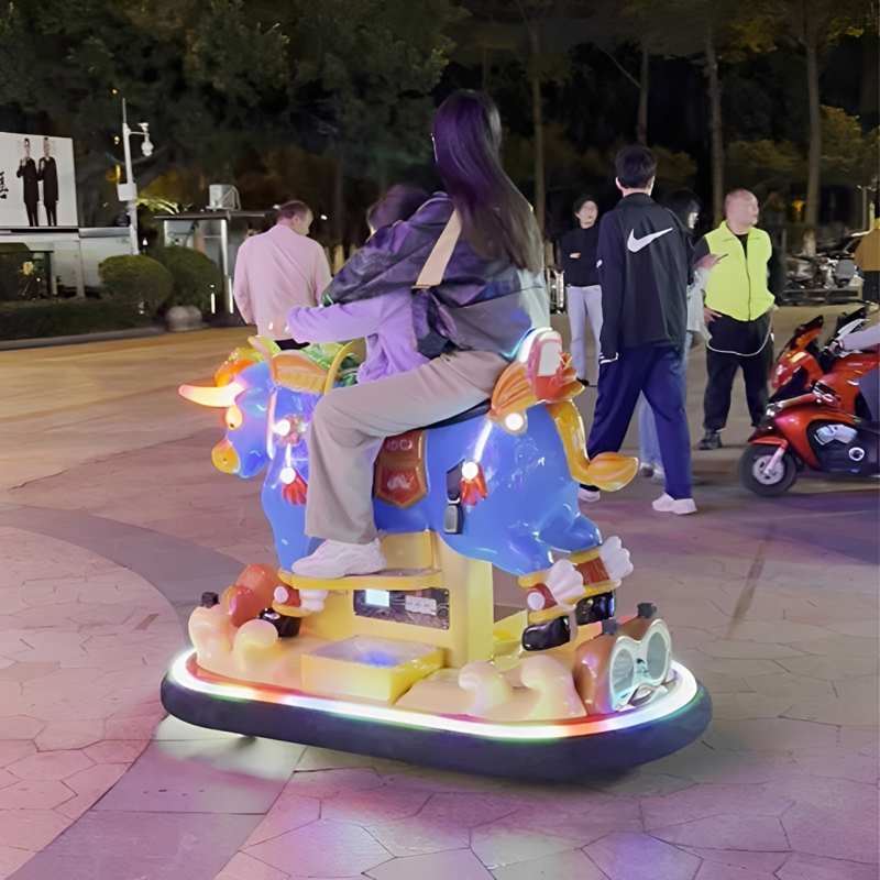 Mother with daughter enjoying a mechanical bull swing ride